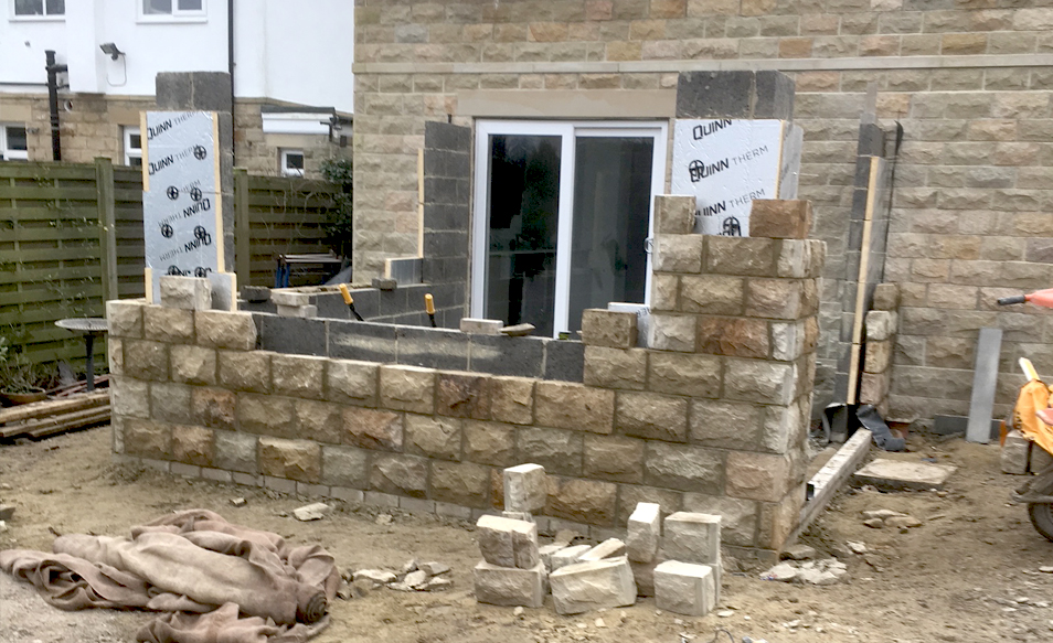 image of stone veneer house extension